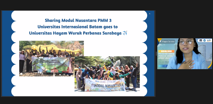 A group of people holding a banner Description automatically generated
