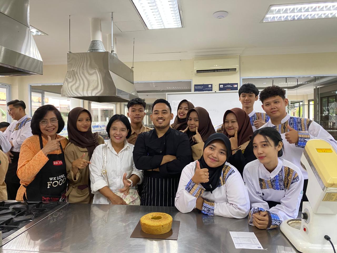 A group of people posing for a photo

Description automatically generated