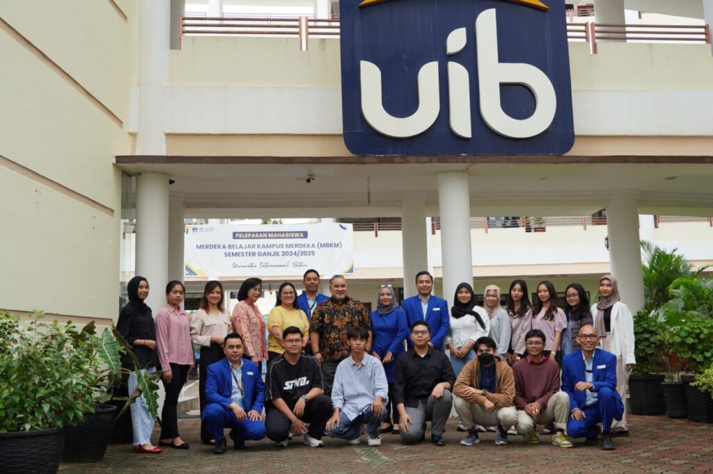 A group of people posing for a photo Description automatically generated