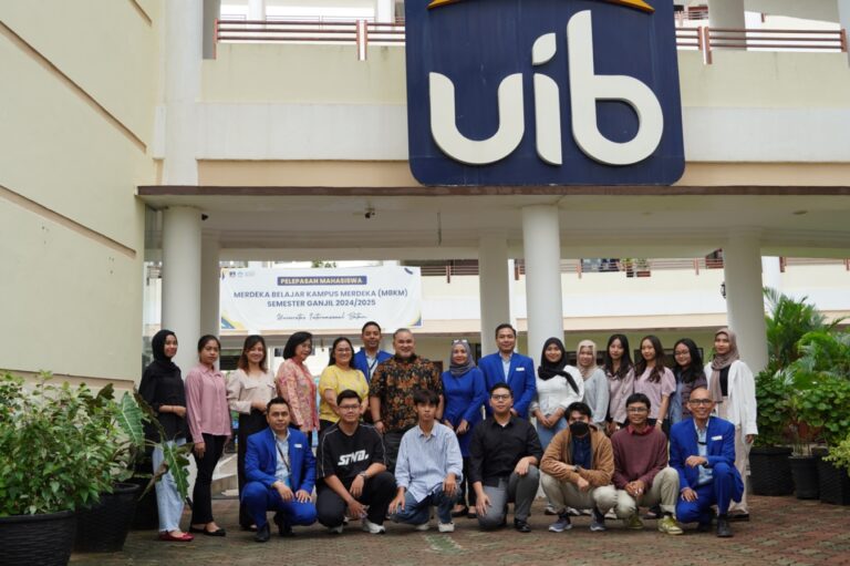 A group of people posing for a photo Description automatically generated