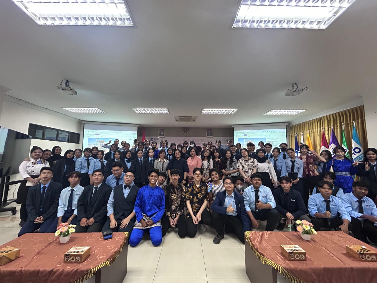 A group of people posing for a photo

AI-generated content may be incorrect.