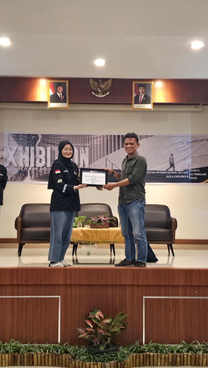A person and person holding a certificate

AI-generated content may be incorrect.