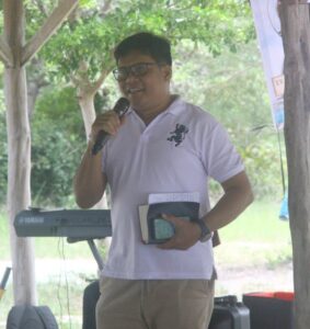 A person holding a microphone