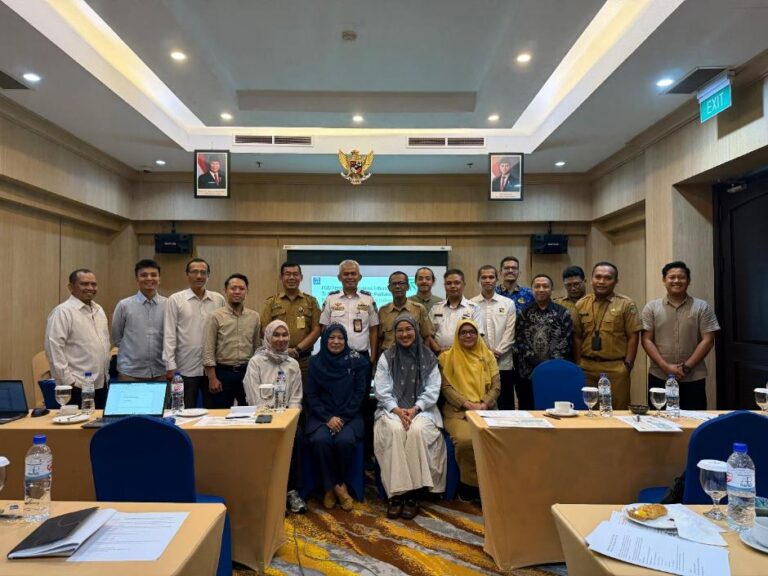 A group of people posing for a photo Description automatically generated