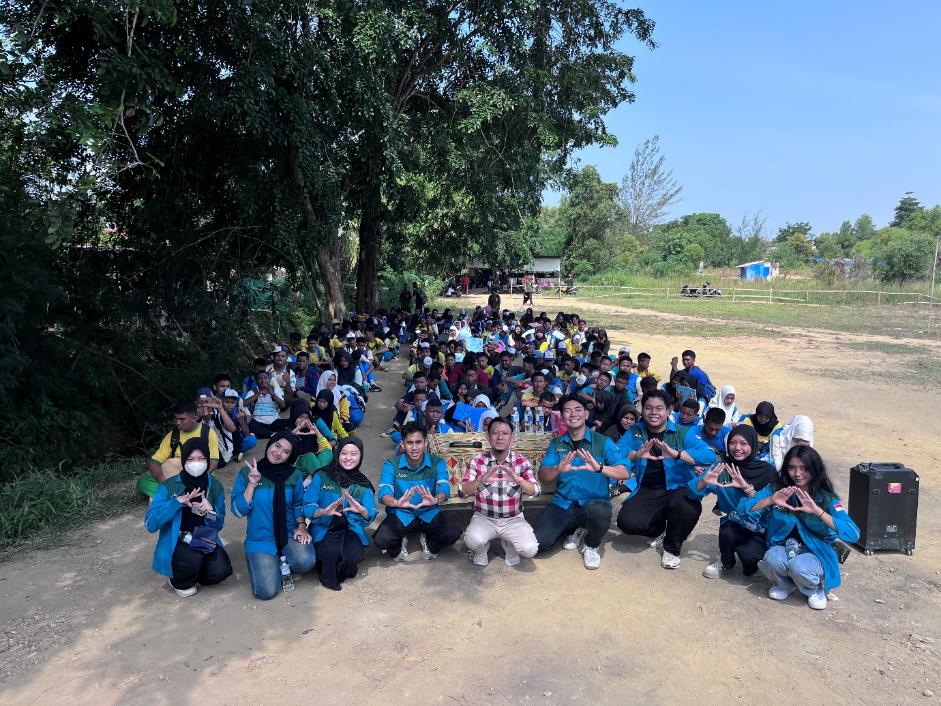 A group of people posing for a photo Description automatically generated