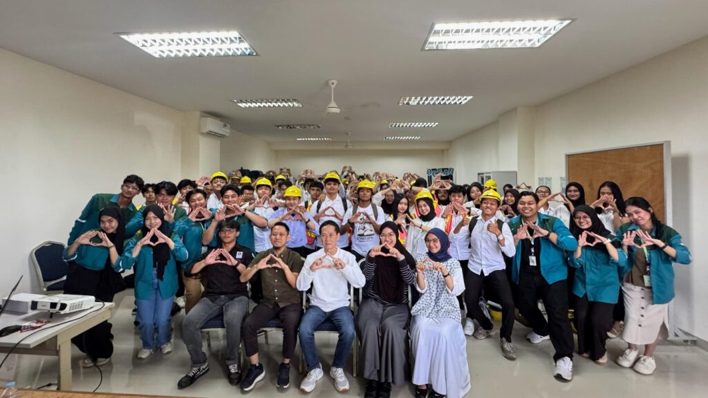 A group of people posing for a photo Description automatically generated