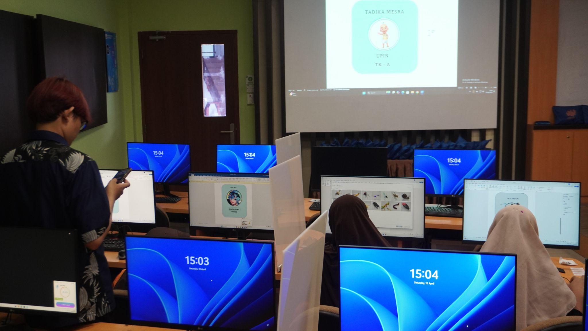 A room with computers and a projector screen AI-generated content may be incorrect.