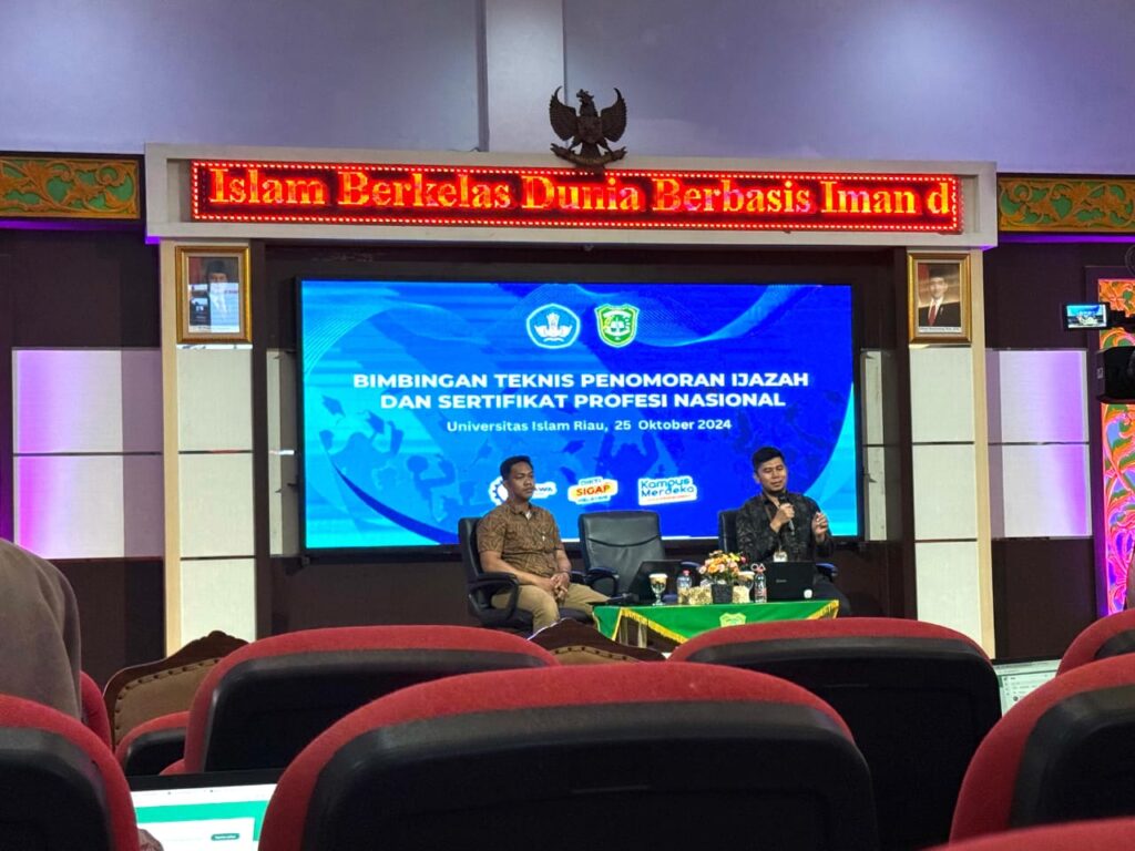 A group of people sitting in front of a screen AI-generated content may be incorrect.