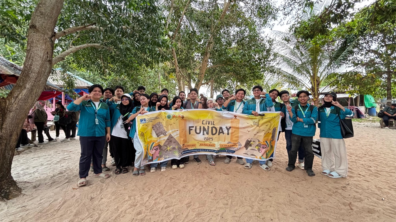 A group of people holding a banner

Description automatically generated
