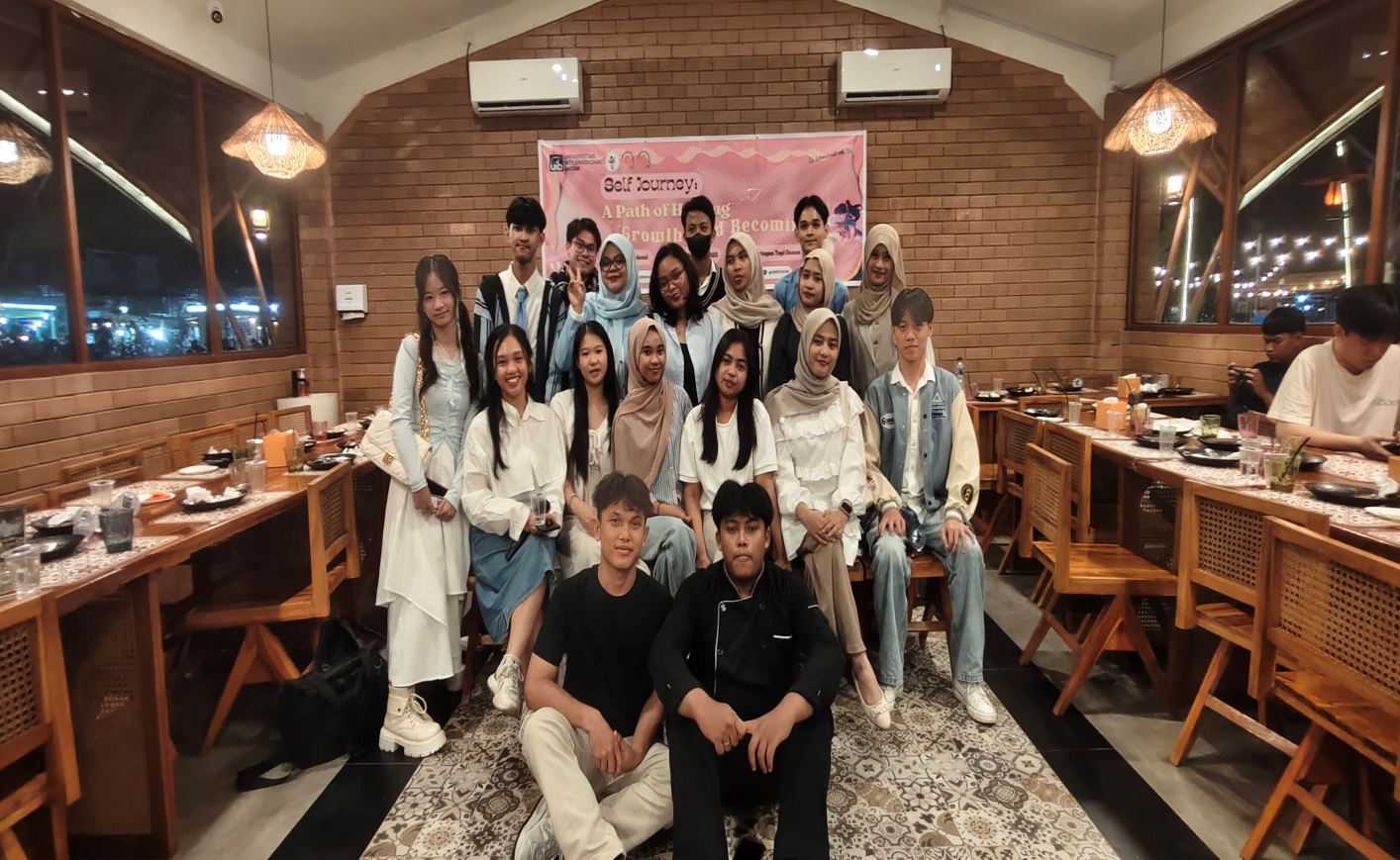 A group of people posing for a photo

AI-generated content may be incorrect.