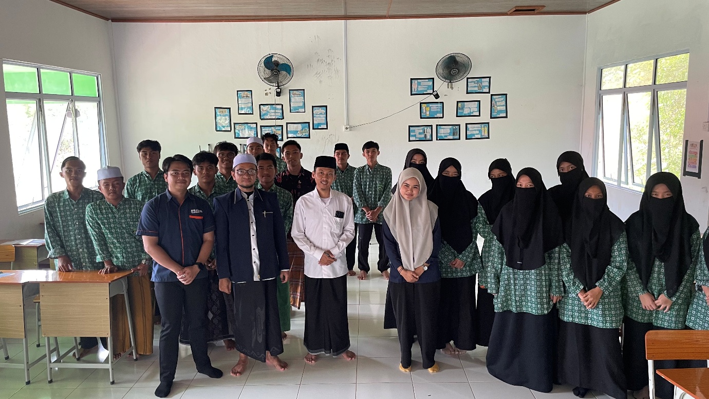 A group of people posing for a photo
Description automatically generated