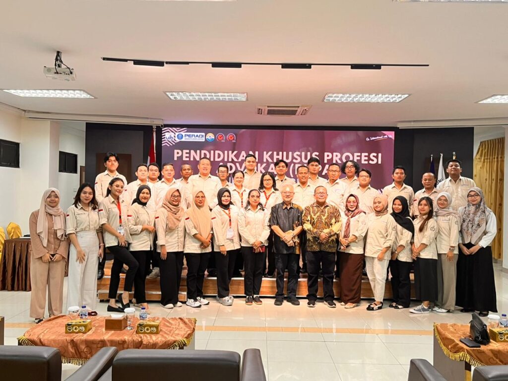 A group of people posing for a photo Description automatically generated