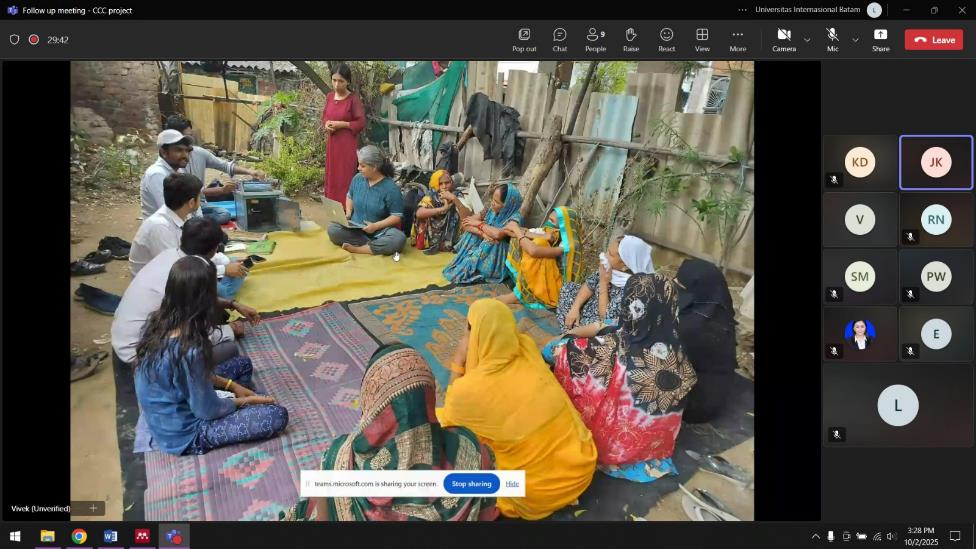 A group of people sitting on the ground

AI-generated content may be incorrect.