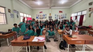 A group of people in a classroom AI-generated content may be incorrect.