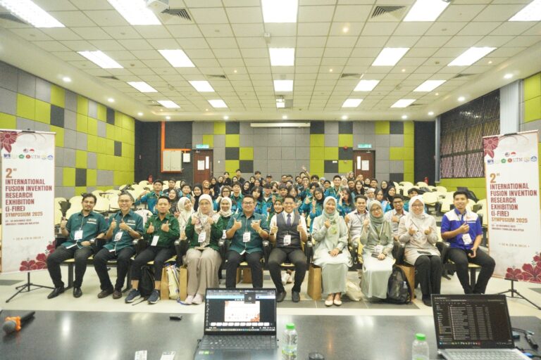 A group of people in a room Description automatically generated