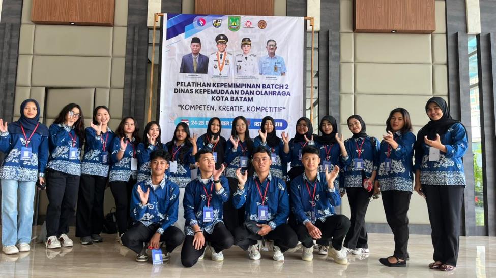 A group of people posing for a photo AI-generated content may be incorrect.