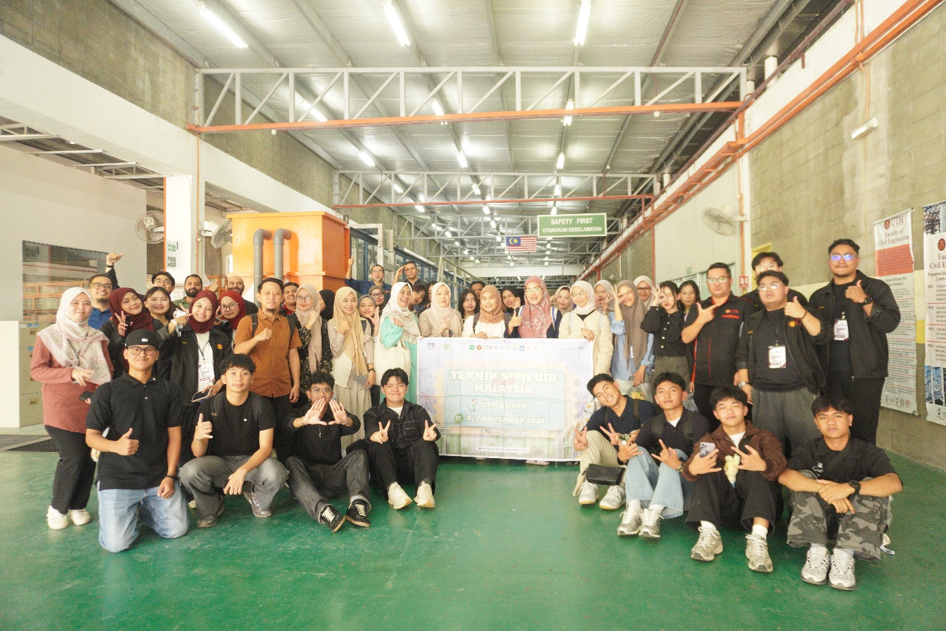 A group of people posing for a photo
Description automatically generated