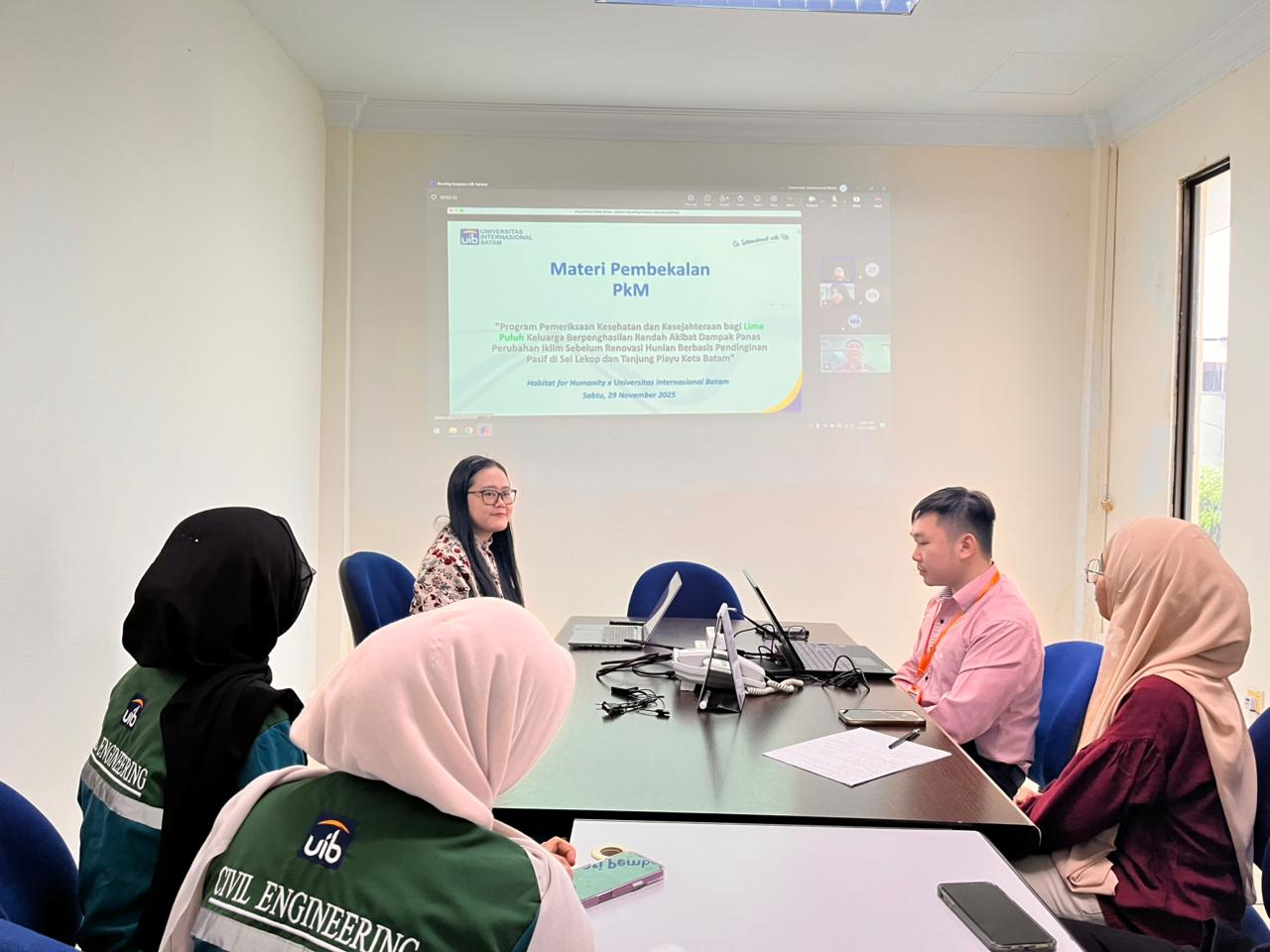 A group of people sitting around a table

AI-generated content may be incorrect.