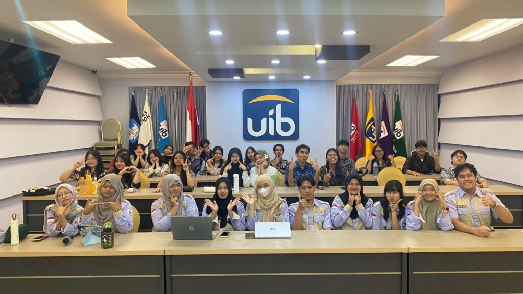 A group of people sitting in a room AI-generated content may be incorrect.