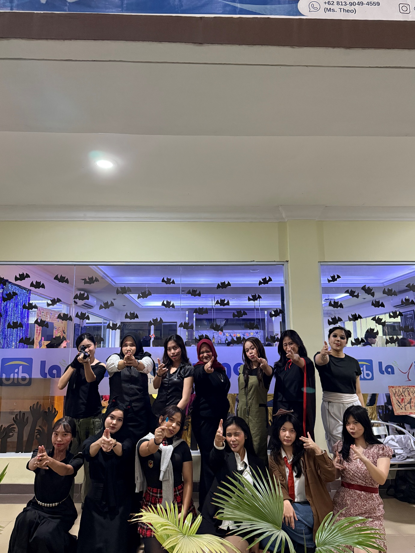 A group of women posing for a photo
AI-generated content may be incorrect.