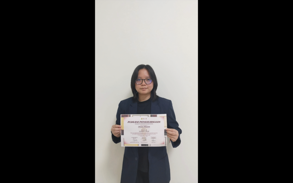 A person holding a paper Description automatically generated