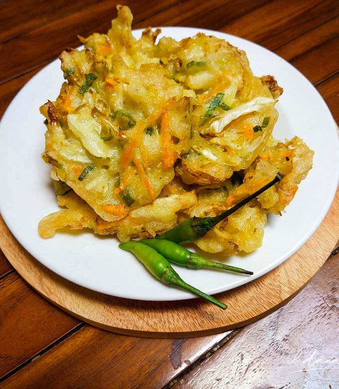 A plate of food on a wood surface
AI-generated content may be incorrect.