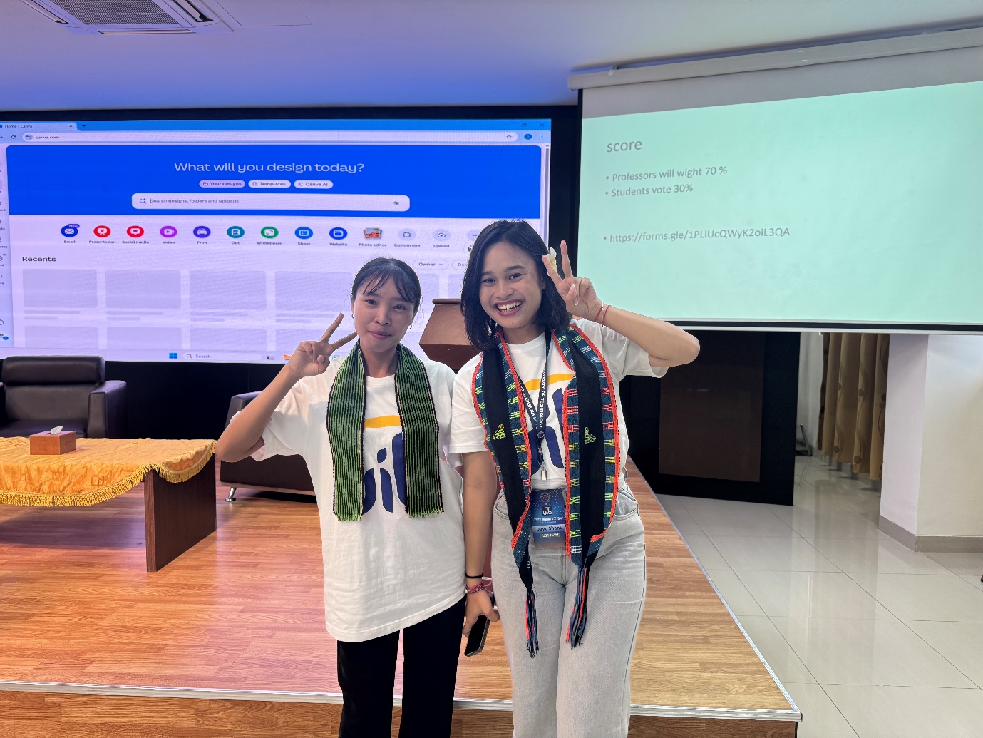 Two girls standing in front of a projector screen
AI-generated content may be incorrect.