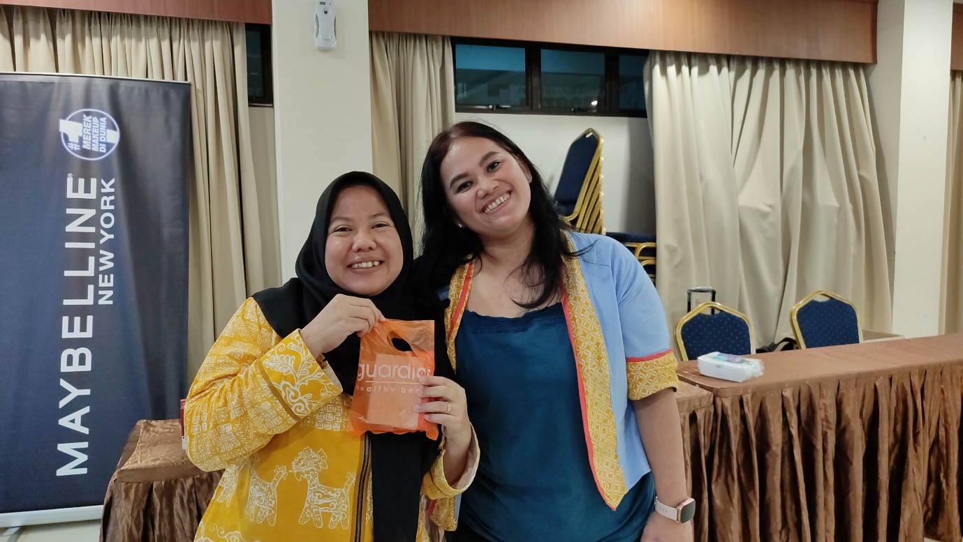 Two women smiling at the camera

AI-generated content may be incorrect.