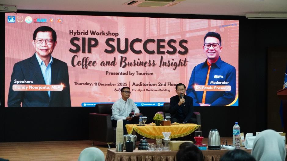 A group of men sitting on a stage

AI-generated content may be incorrect.