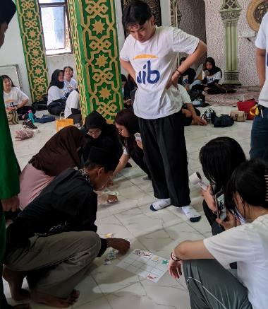 A group of people sitting on the floor

AI-generated content may be incorrect.