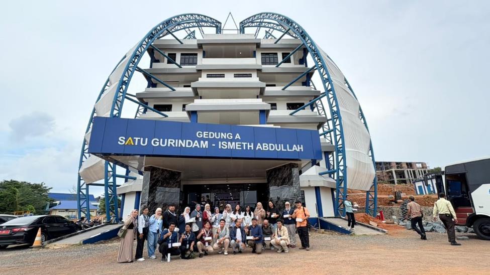 A group of people standing in front of a building AI-generated content may be incorrect.