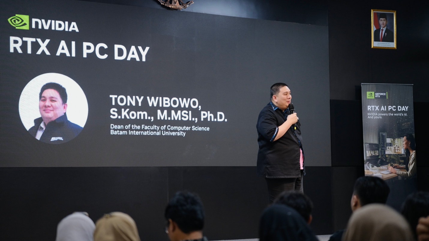 A person standing in front of a large screen

AI-generated content may be incorrect.