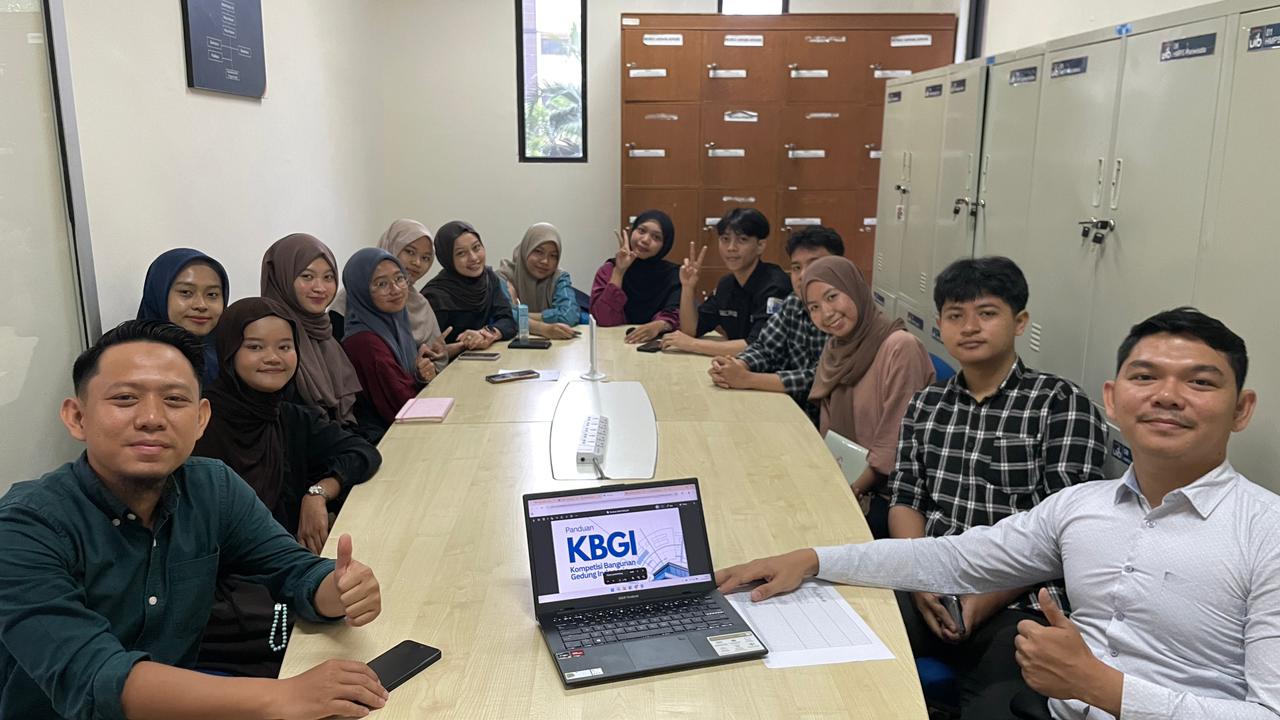 A group of people sitting around a table
Description automatically generated